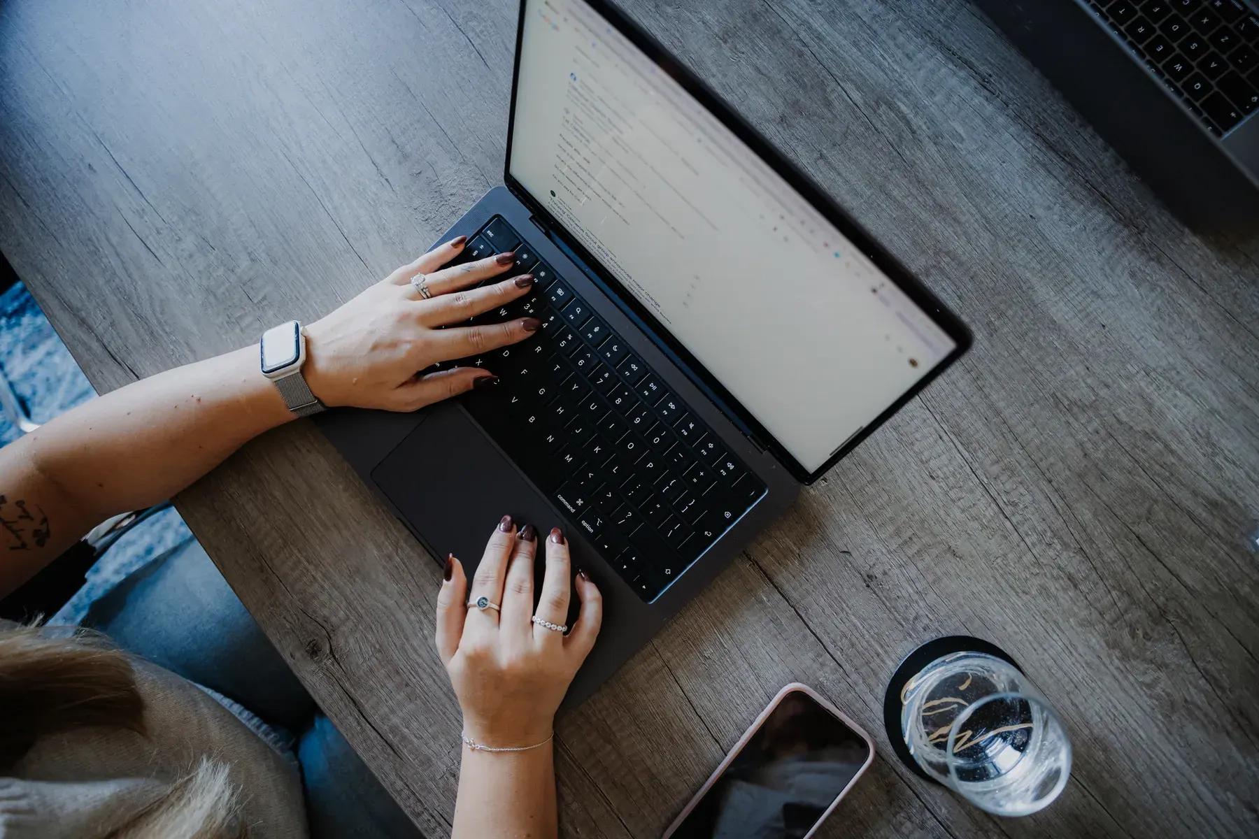Typing on a laptop, from above
